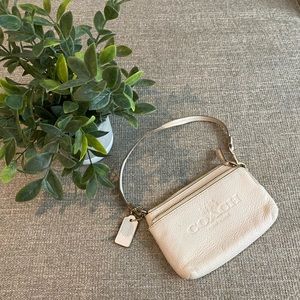 White coach wristlet wallet.